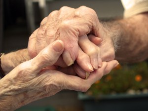 bigstock_Old_Couple_Holding_Hands_2041049